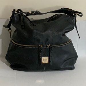 Beautiful Dooney & Bourke Black leather Satchel .